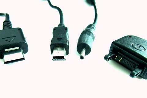 Charger connectors of different mobile phones (from the left: Samsung E900, Motorola V3, Nokia 6101, Sony Ericsson K750)