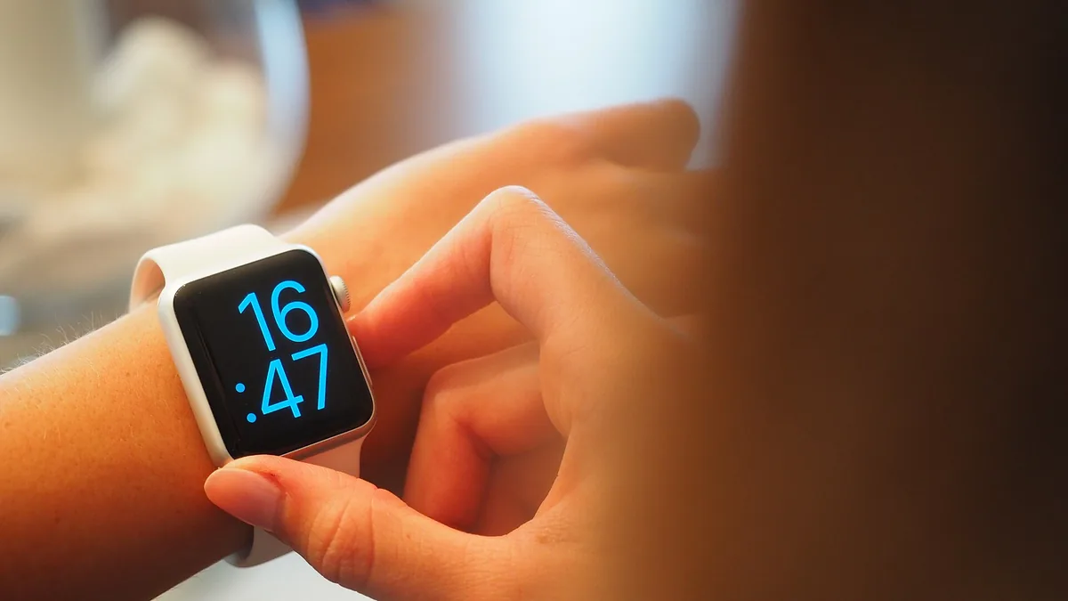 This is a smart watch on a girl's hand