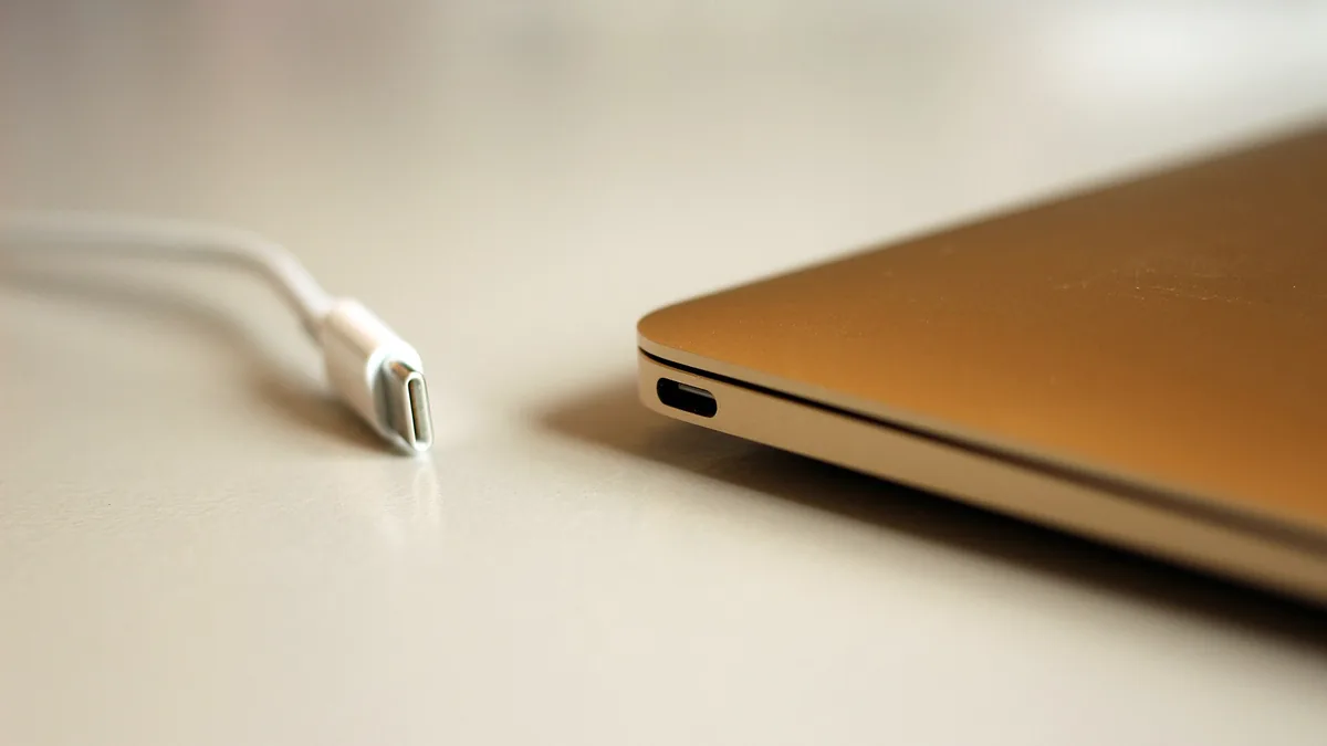 Photo of a MacBook with Retina Display (2015 model), showing the USB type-c connector