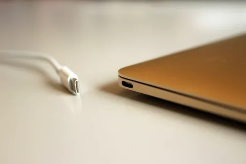 Photo of a MacBook with Retina Display (2015 model), showing the USB type-c connector