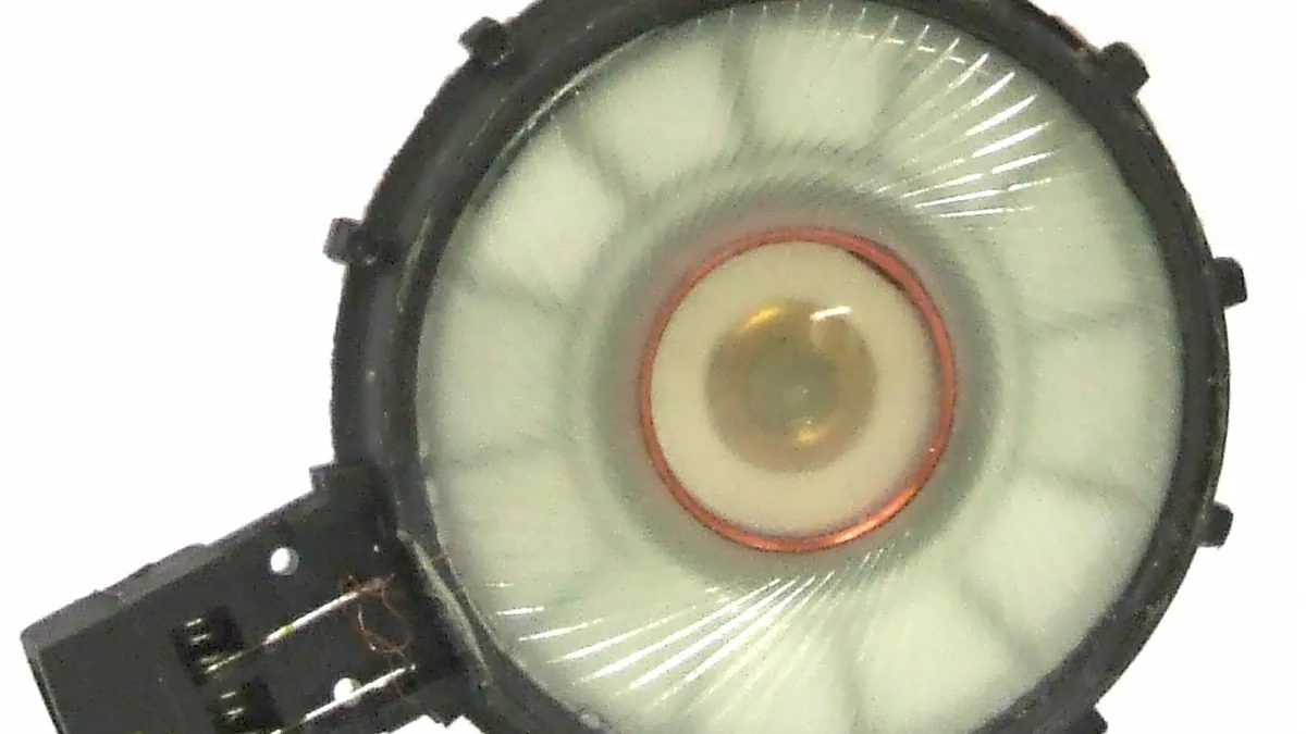The transducer (speaker) from a pair of mid-priced headphones