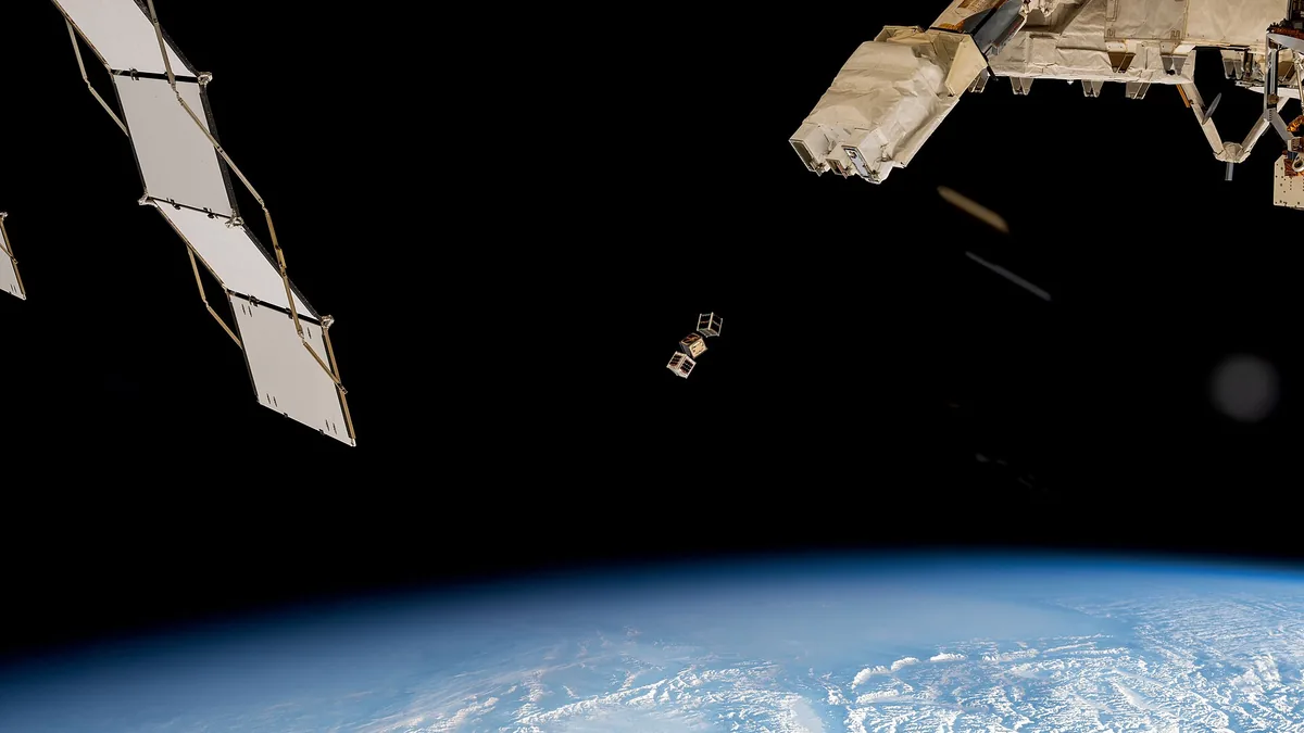 iss072e352045 (Dec. 9, 2024) --- A trio of CubeSats is ejected into Earth orbit from a small satellite orbital deployer attached to the International Space Station's Kibo laboratory module. A series of CubeSats were depl