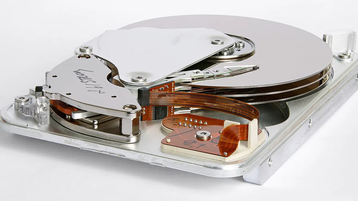 Inner view of a Seagate 3.5 inch hard disk drive Medalist ST33232A model manufactured in Malaysia in 1998. Parallel ATA interface, ultra DMA mode 2, I/O data-transfer rate 33.3 MB/s max, 3,227 MB , 3 platters , 6 physica